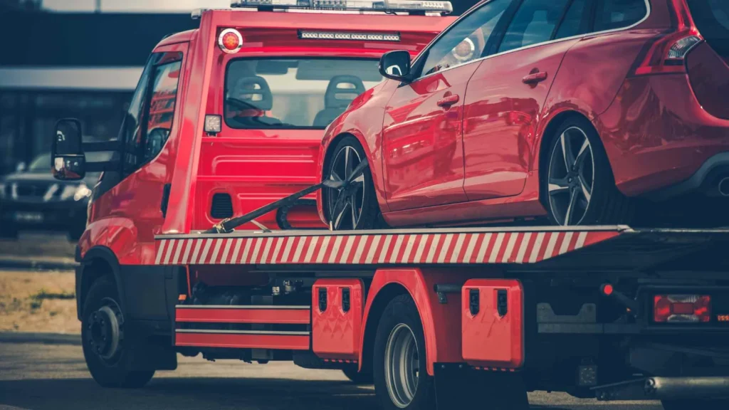 a tow truck with a car on it