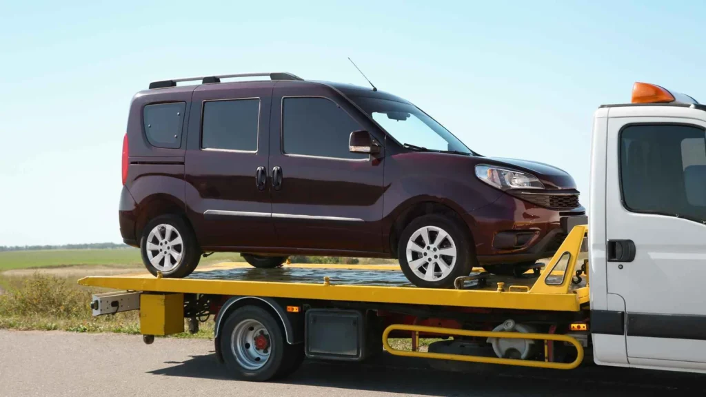 a car on a flatbed trailer